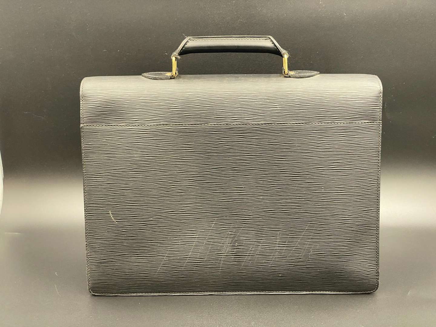 <p>LOUIS VUITTON, Serviet Conseie Epi, stitched black leather briefcase,</p>