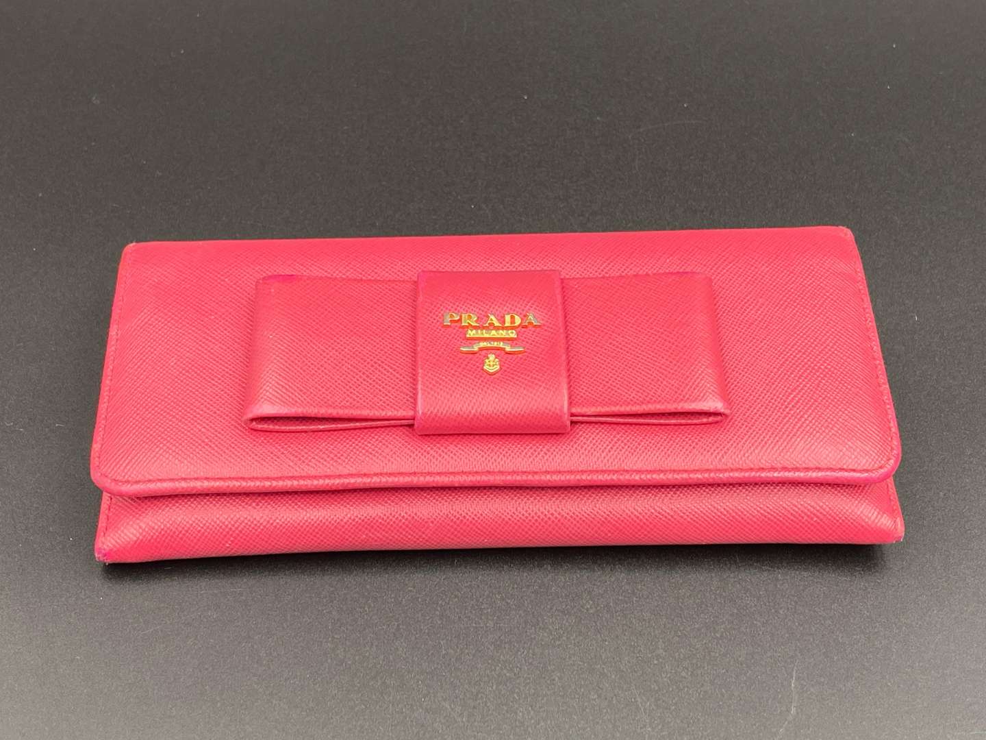 <p>PRADA, a Saffiano, pink leather, ribbon purse,</p>
