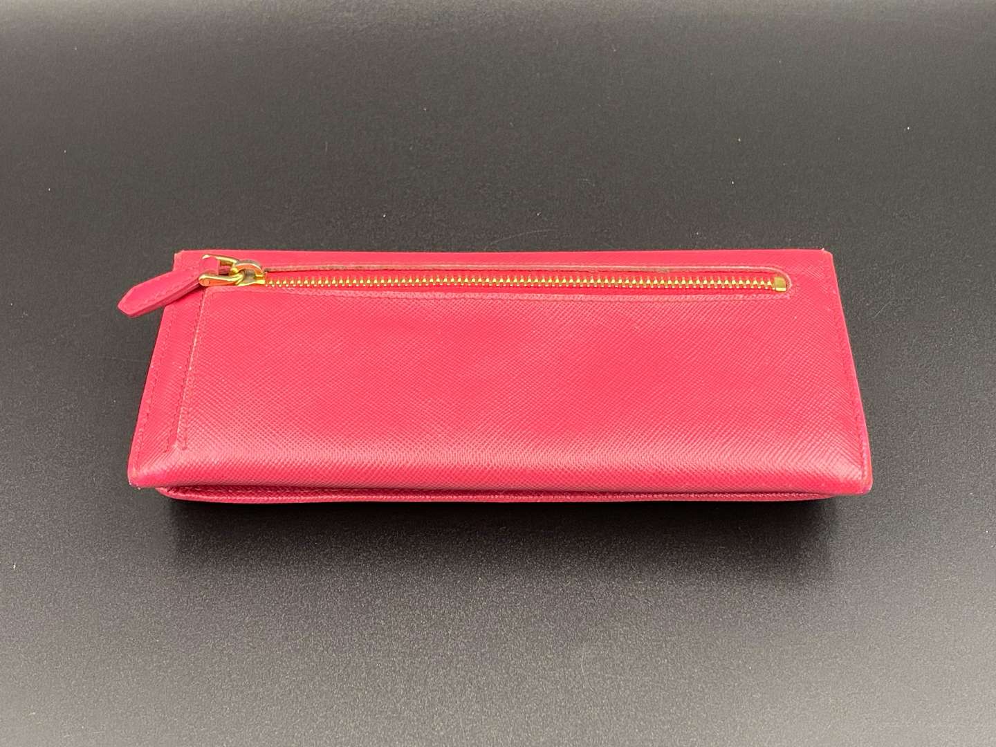 <p>PRADA, a Saffiano, pink leather, ribbon purse,</p>