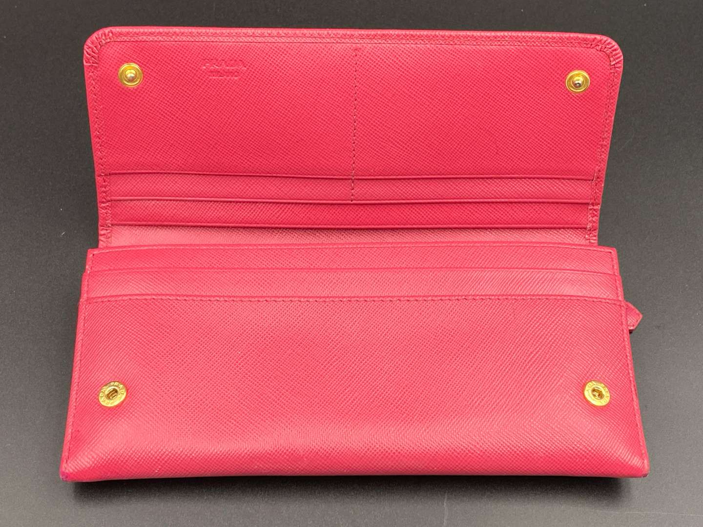 <p>PRADA, a Saffiano, pink leather, ribbon purse,</p>