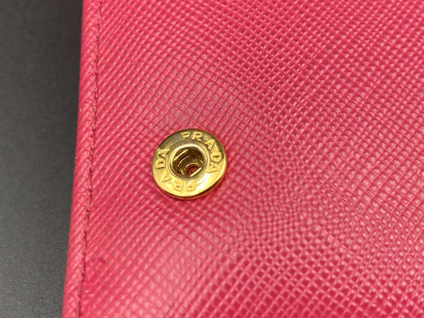 <p>PRADA, a Saffiano, pink leather, ribbon purse,</p>