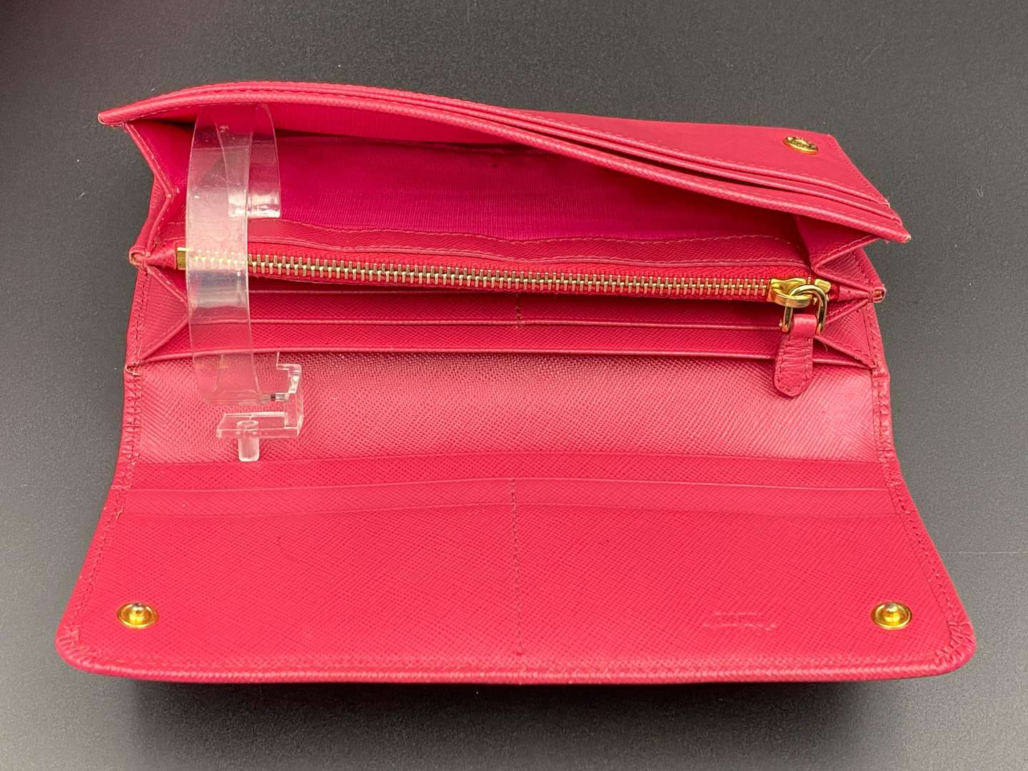 <p>PRADA, a Saffiano, pink leather, ribbon purse,</p>