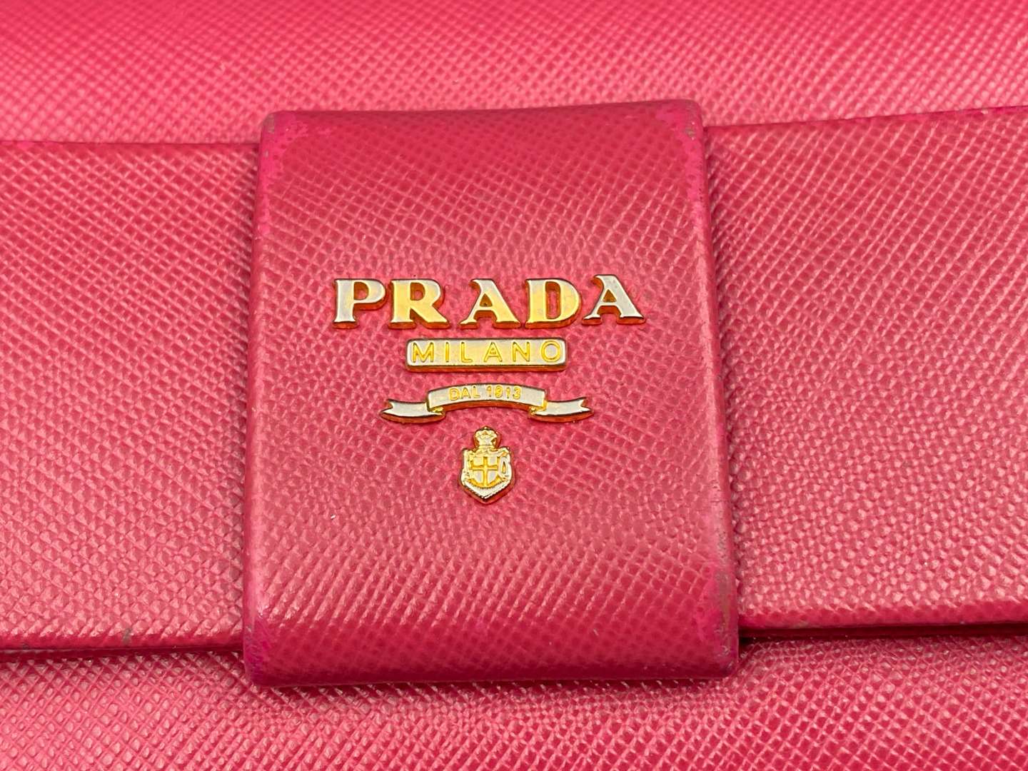 <p>PRADA, a Saffiano, pink leather, ribbon purse,</p>