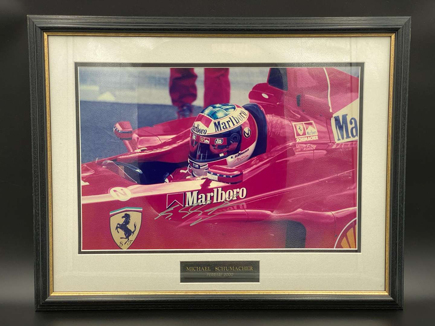 <p>MICHAEL SCHUMACHER, FERRARI, 2000, signed and framed colour photograph with COA</p>