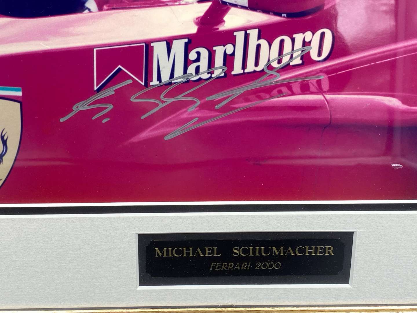 <p>MICHAEL SCHUMACHER, FERRARI, 2000, signed and framed colour photograph with COA</p>