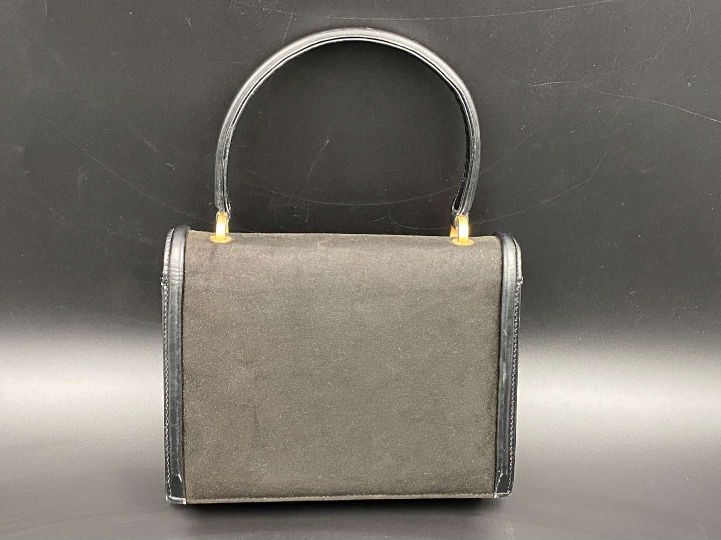 <p>GUCCI AND SAMOT, two various vintage hand bags.</p>