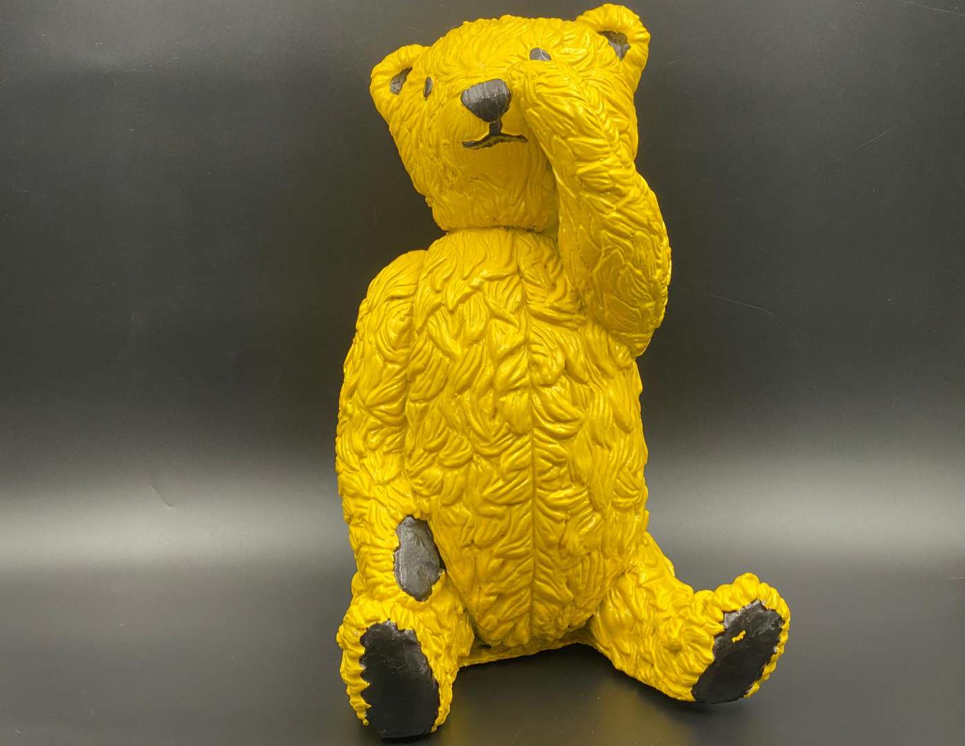 <p>“ALL PROCEEDS TO CHARITY”. A modern cast resin model of a Teddy Bear,</p>