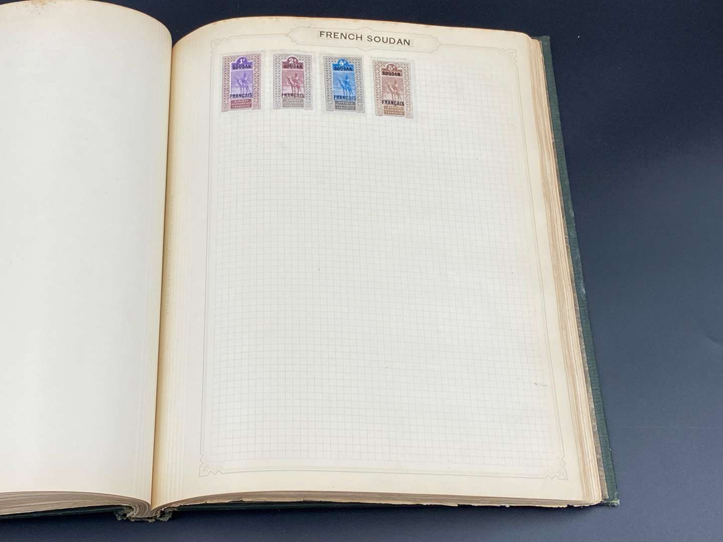 <p>SIMPLEX BLANK STAMP ALBUM, late 19th and early 20th century international stamp album and contents,</p>