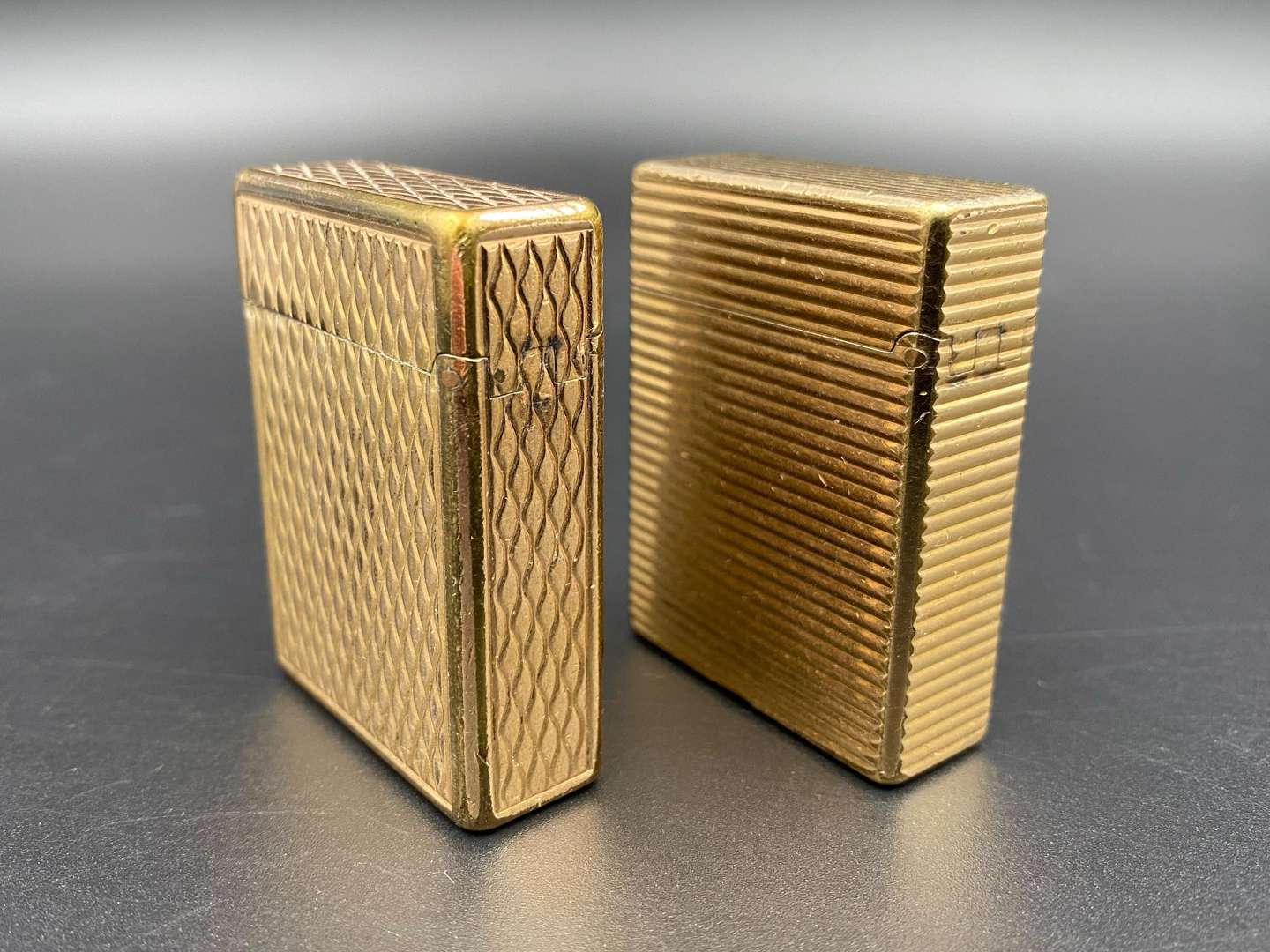 <p>DUPONT, two gold plated gas lighters</p>