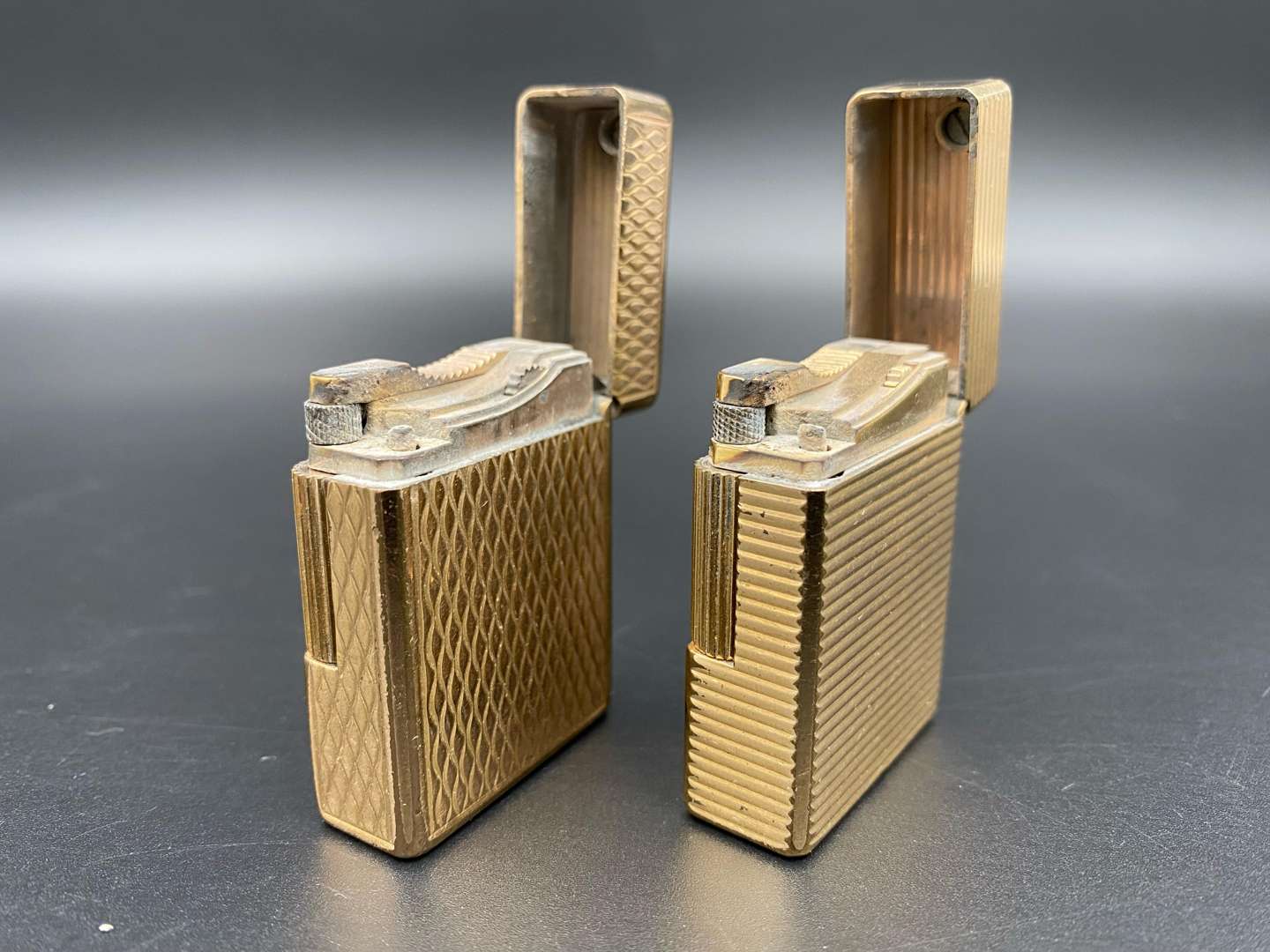 <p>DUPONT, two gold plated gas lighters</p>