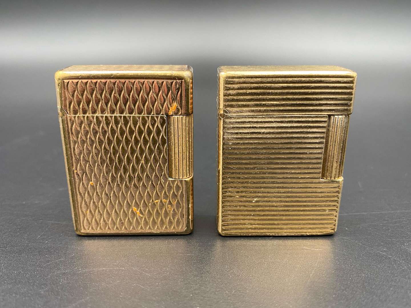 <p>DUPONT, two gold plated gas lighters</p>