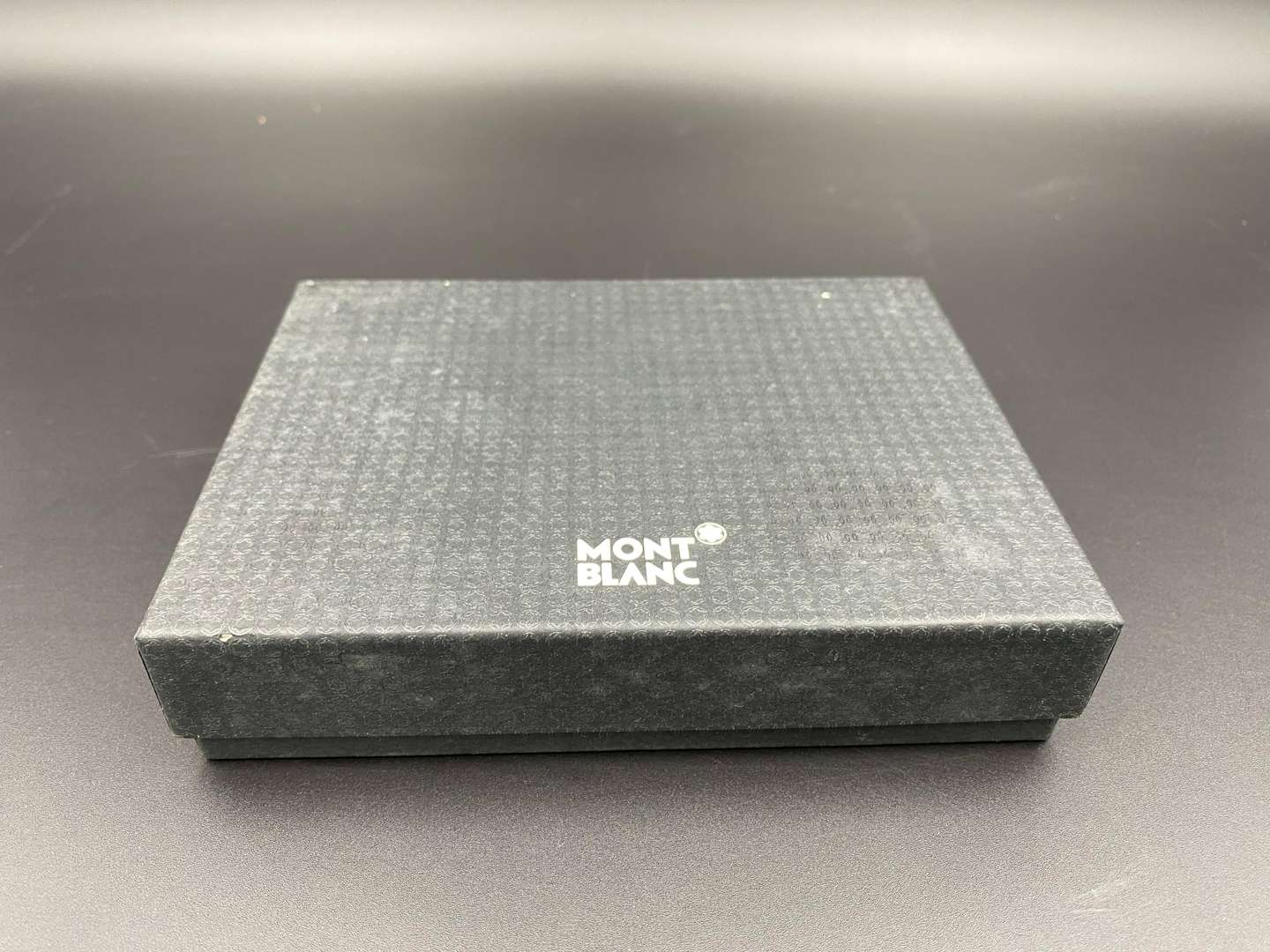 <p>MONT BLANC, a black, stitched leather pocket address book,&nbsp;</p>