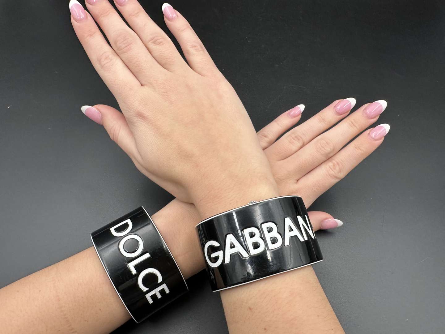 <p>DOLCE & GABBANA, a pair of vintage acrylic cuff bangles</p>