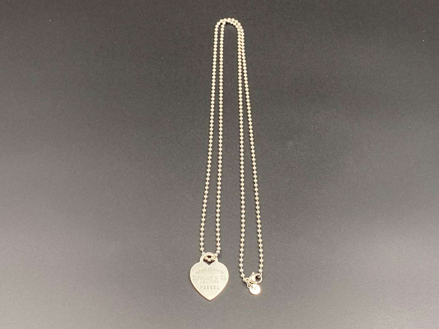 <p>TIFFANY & CO, .925 “RETURN TO TIFFANY”, necklace and charm.</p>