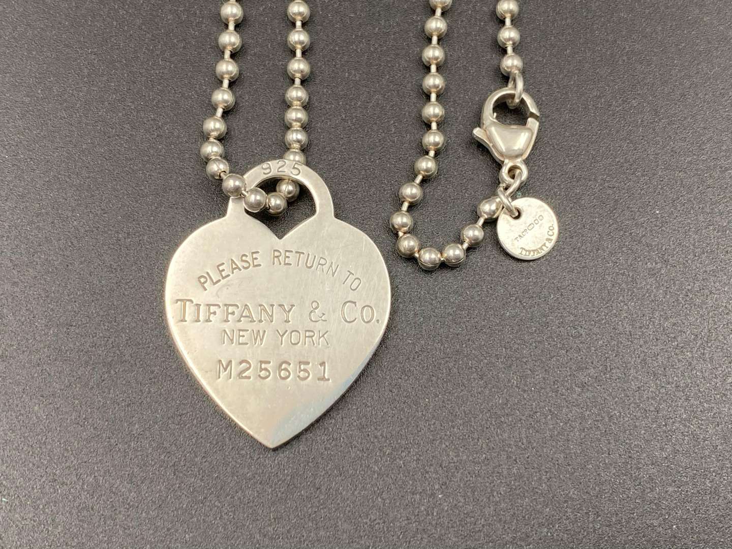 <p>TIFFANY & CO, .925 “RETURN TO TIFFANY”, necklace and charm.</p>