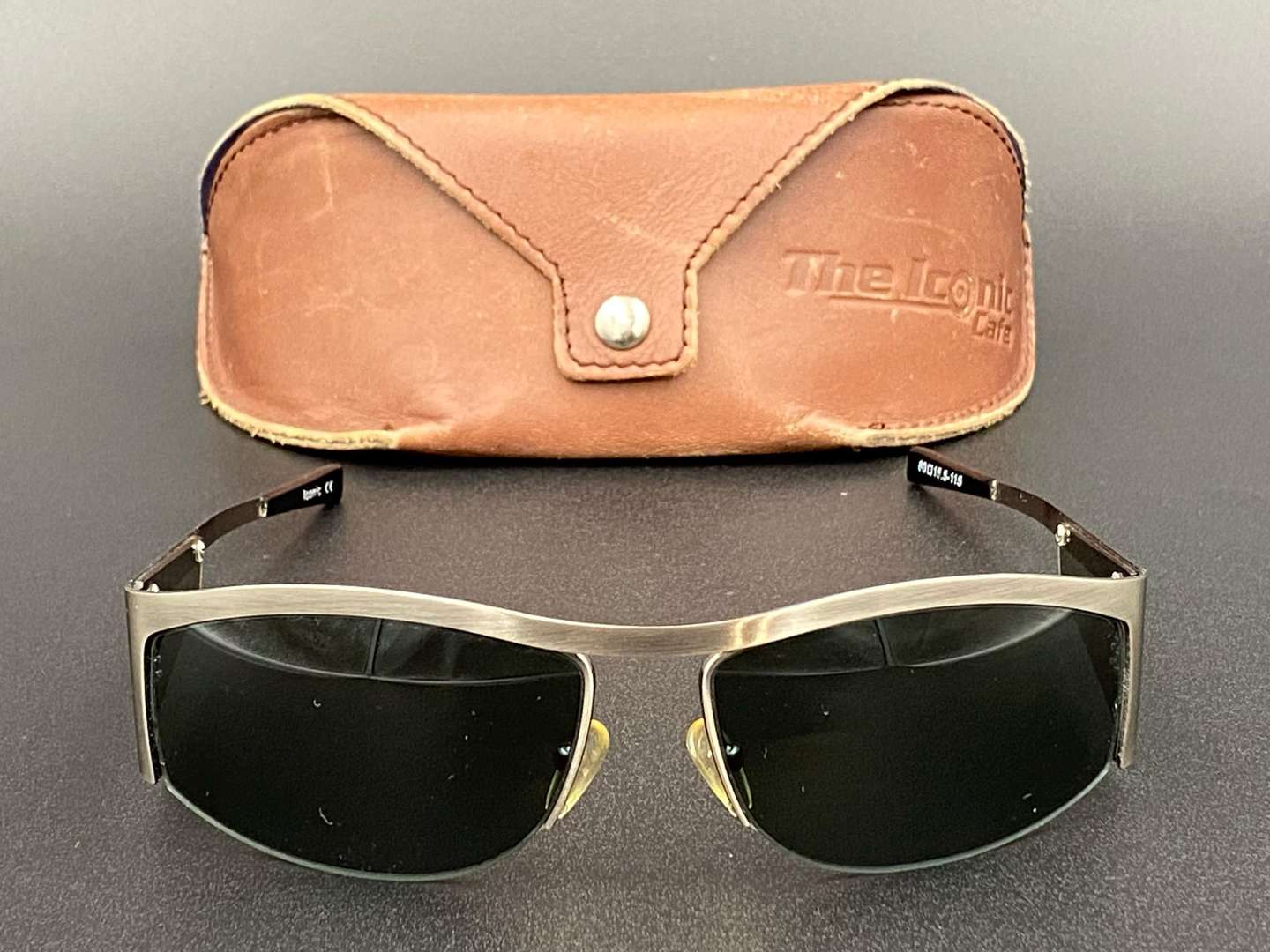 <p>THE ICONIC CAFE, a pair of cased “ITALIAN JOB” style sunglasses,</p>