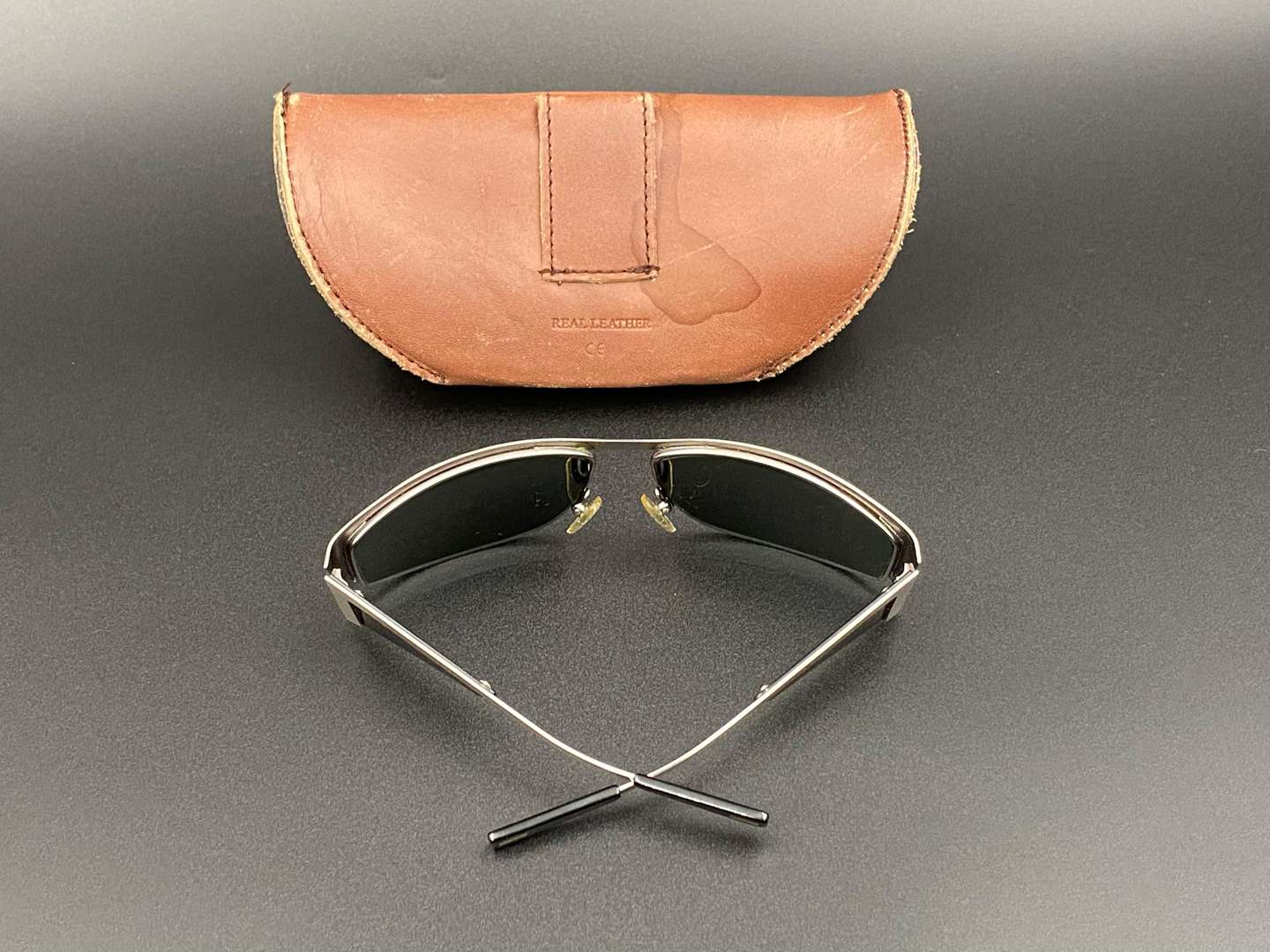 <p>THE ICONIC CAFE, a pair of cased “ITALIAN JOB” style sunglasses,</p>