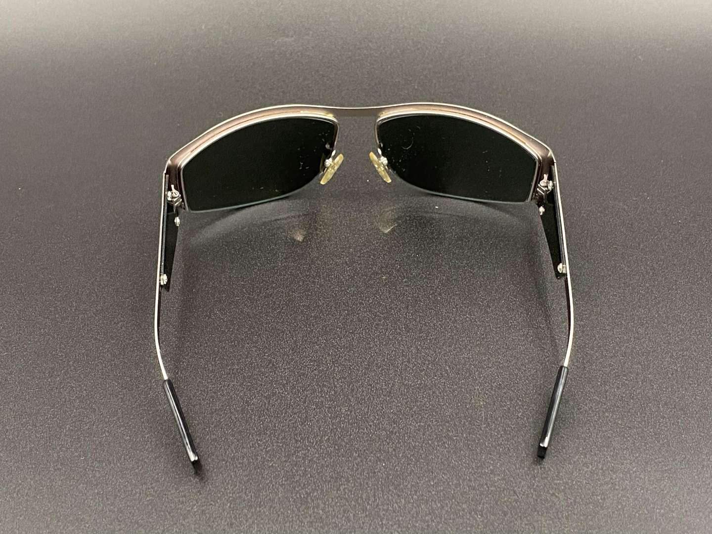<p>THE ICONIC CAFE, a pair of cased “ITALIAN JOB” style sunglasses,</p>