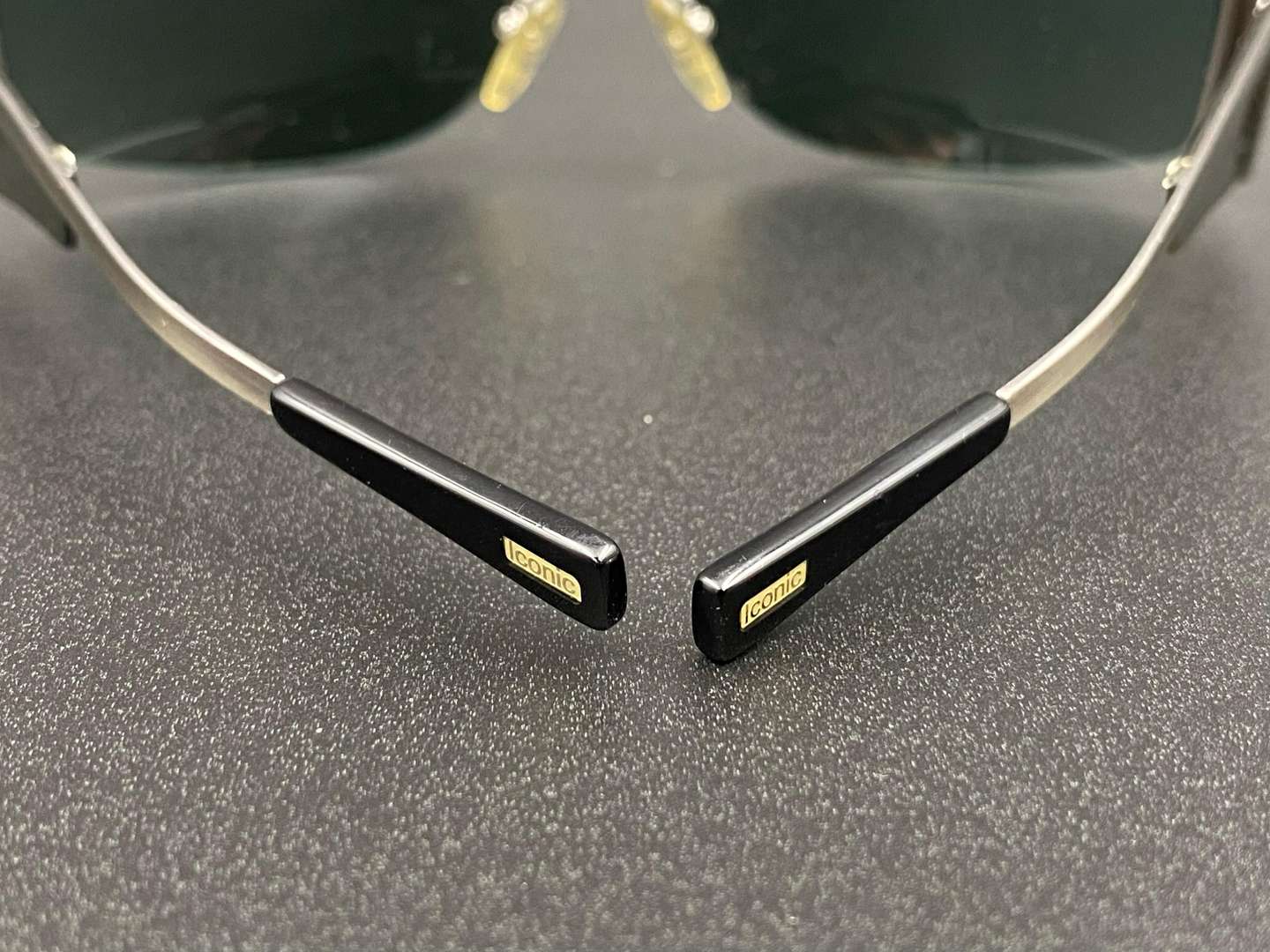 <p>THE ICONIC CAFE, a pair of cased “ITALIAN JOB” style sunglasses,</p>