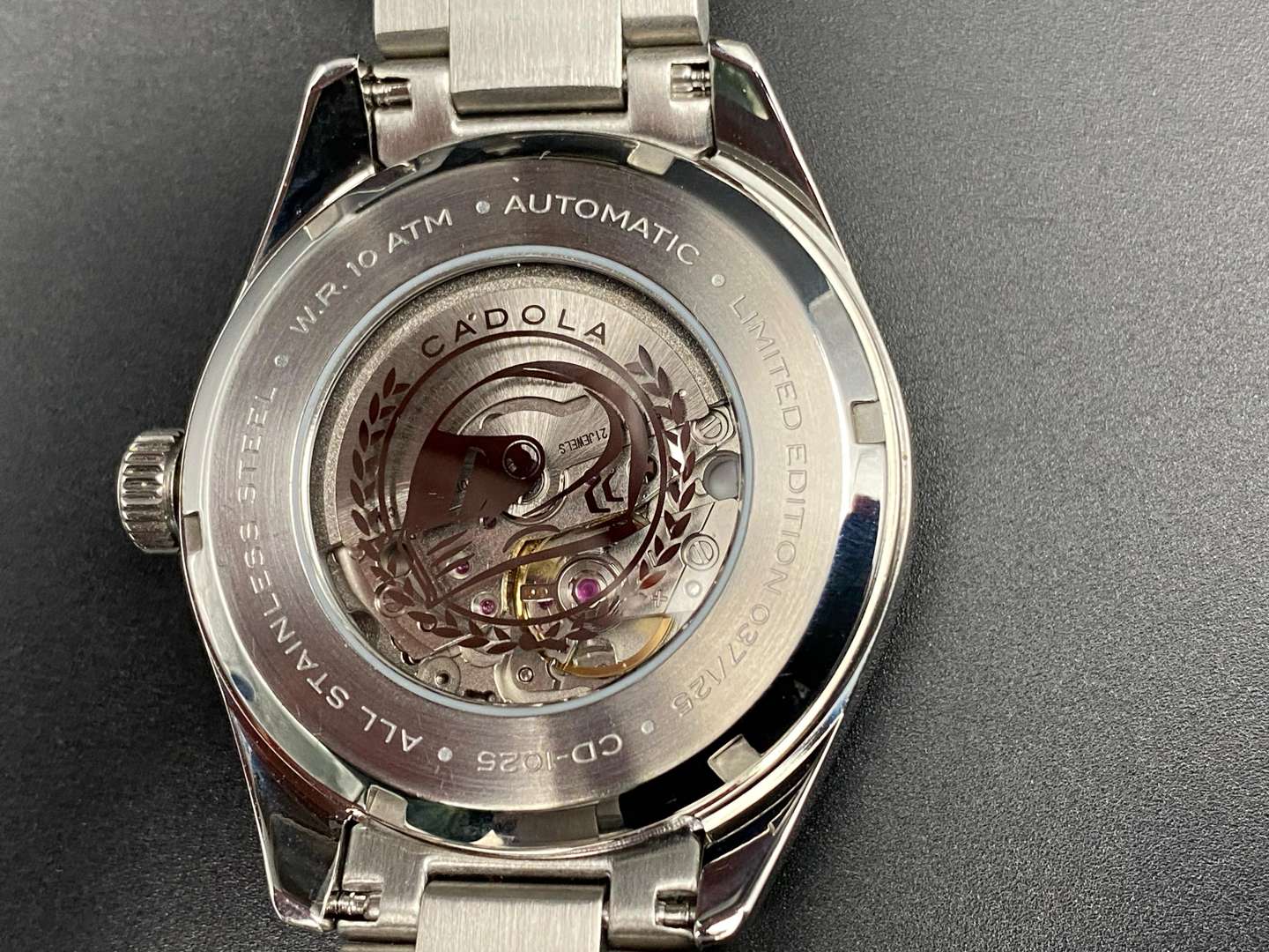 <p>CADOLA, &nbsp;COSWORTH, a stainless steel, automatic, centre seconds, calendar wristwatch, 037/125, CD-1025,</p>