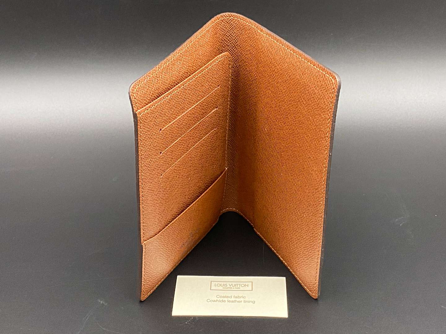 <p>LOUIS VUITTON, a monogrammed, coated canvas and leather passport cover</p>