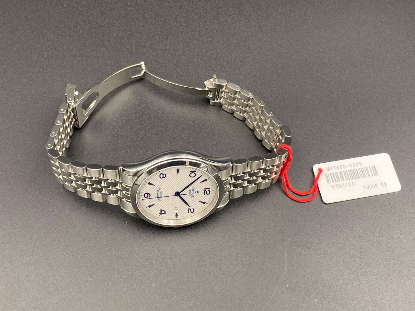 <p>TUDOR, GENEVE, stainless steel, center seconds, calendar wristwatch, Model 91650, 9TN1750</p>