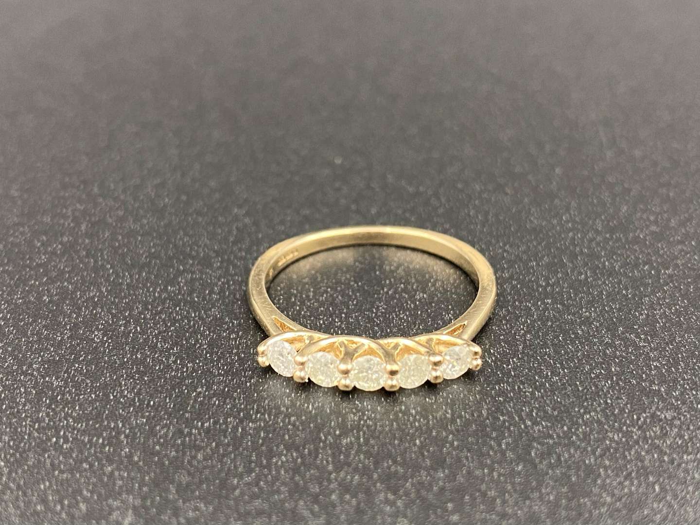 <p>A Diamond set, five stone, 9ct gold ring,</p>