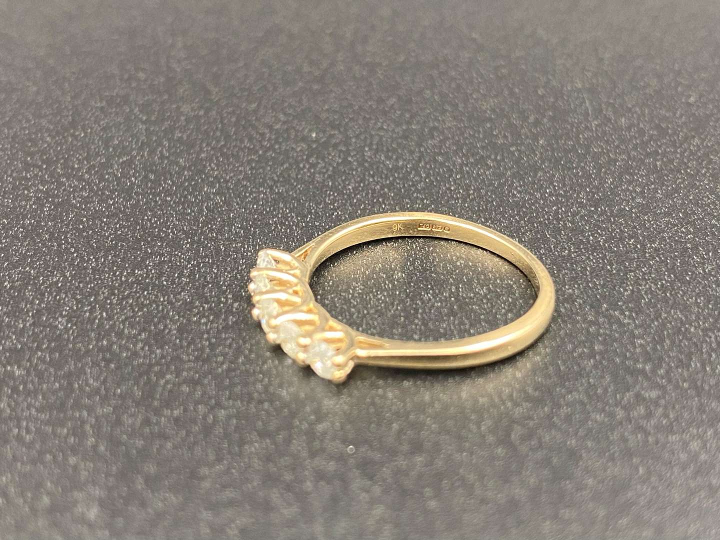 <p>A Diamond set, five stone, 9ct gold ring,</p>