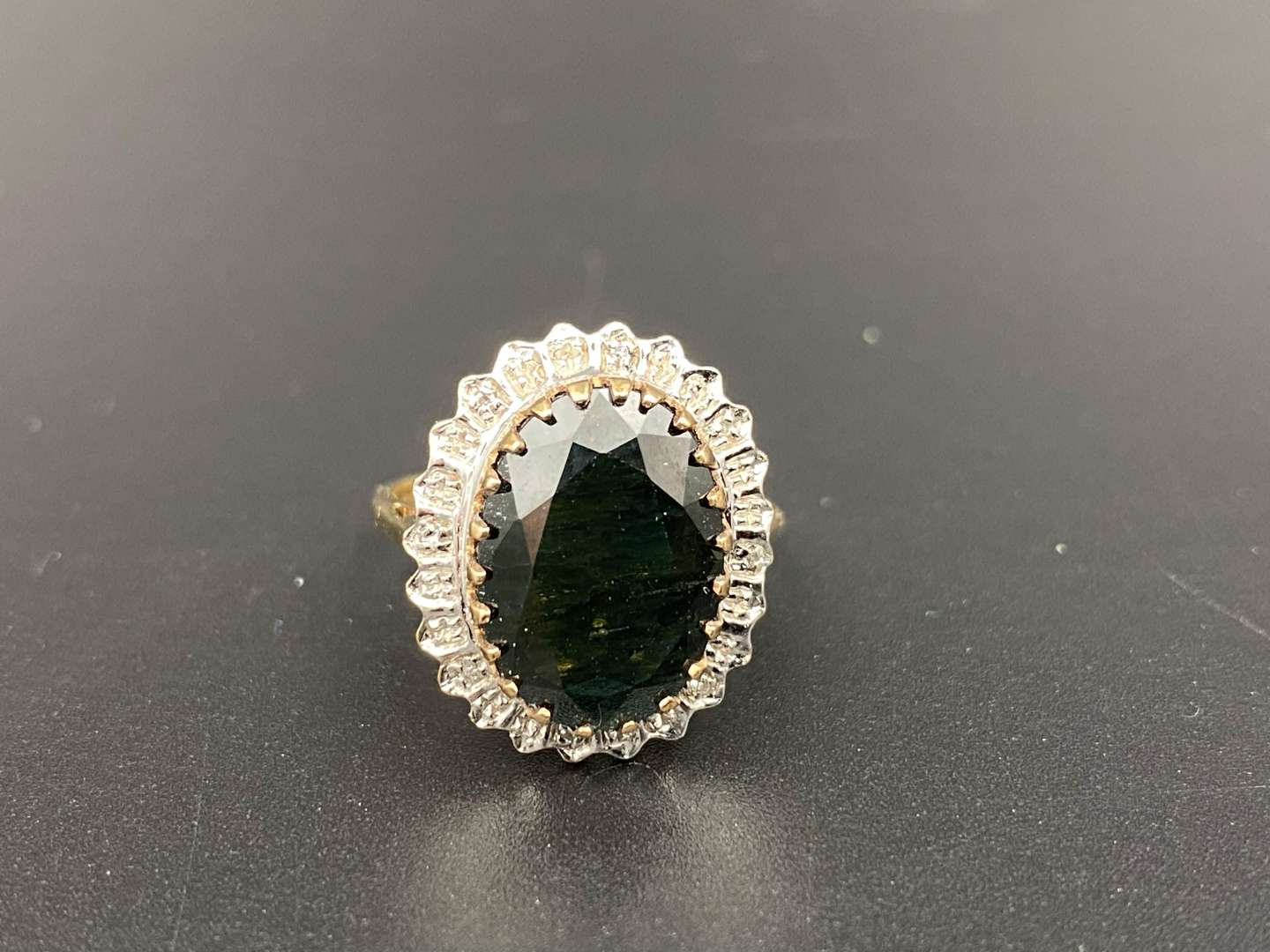 <p>A large Sapphire & Diamond 9ct gold ring</p>