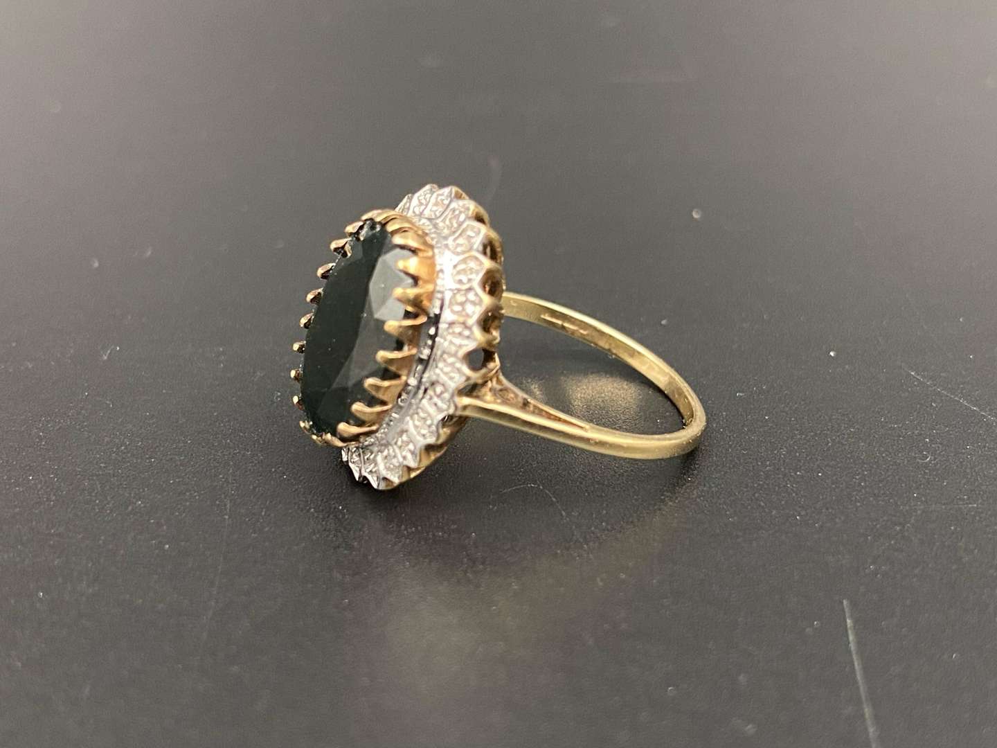 <p>A large Sapphire & Diamond 9ct gold ring</p>