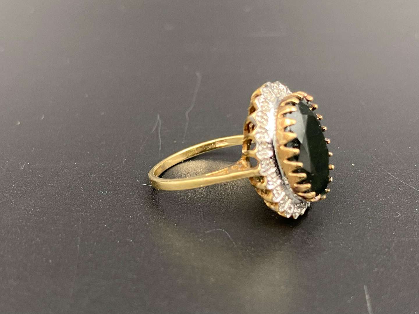 <p>A large Sapphire & Diamond 9ct gold ring</p>