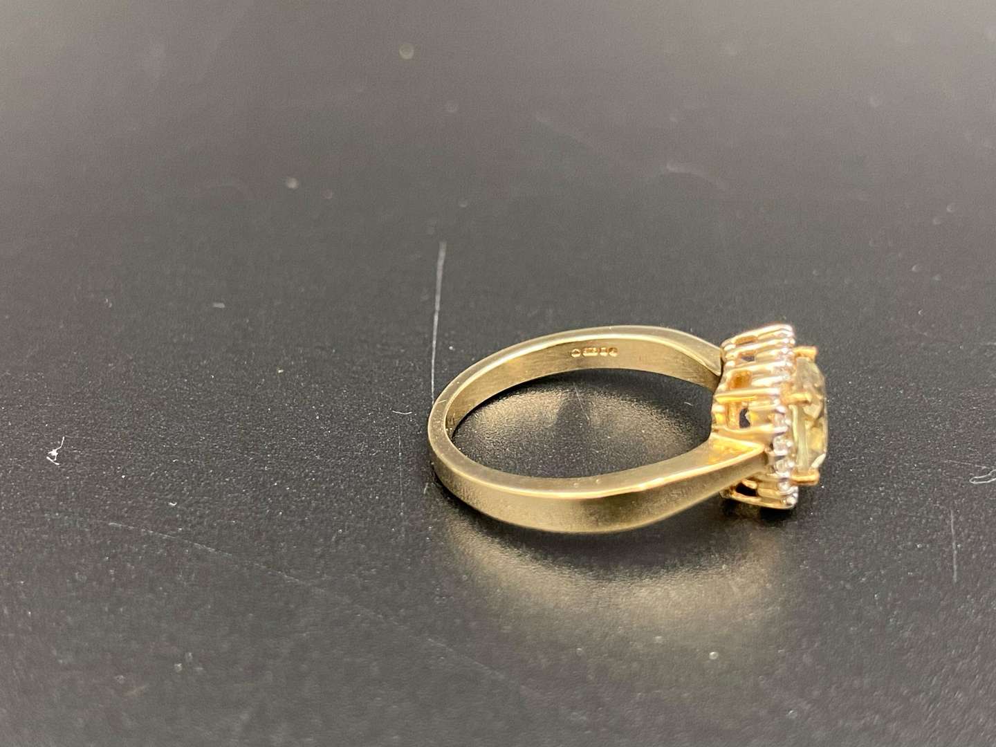 <p>A Citrine and Diamond set, 9ct gold ring.</p>