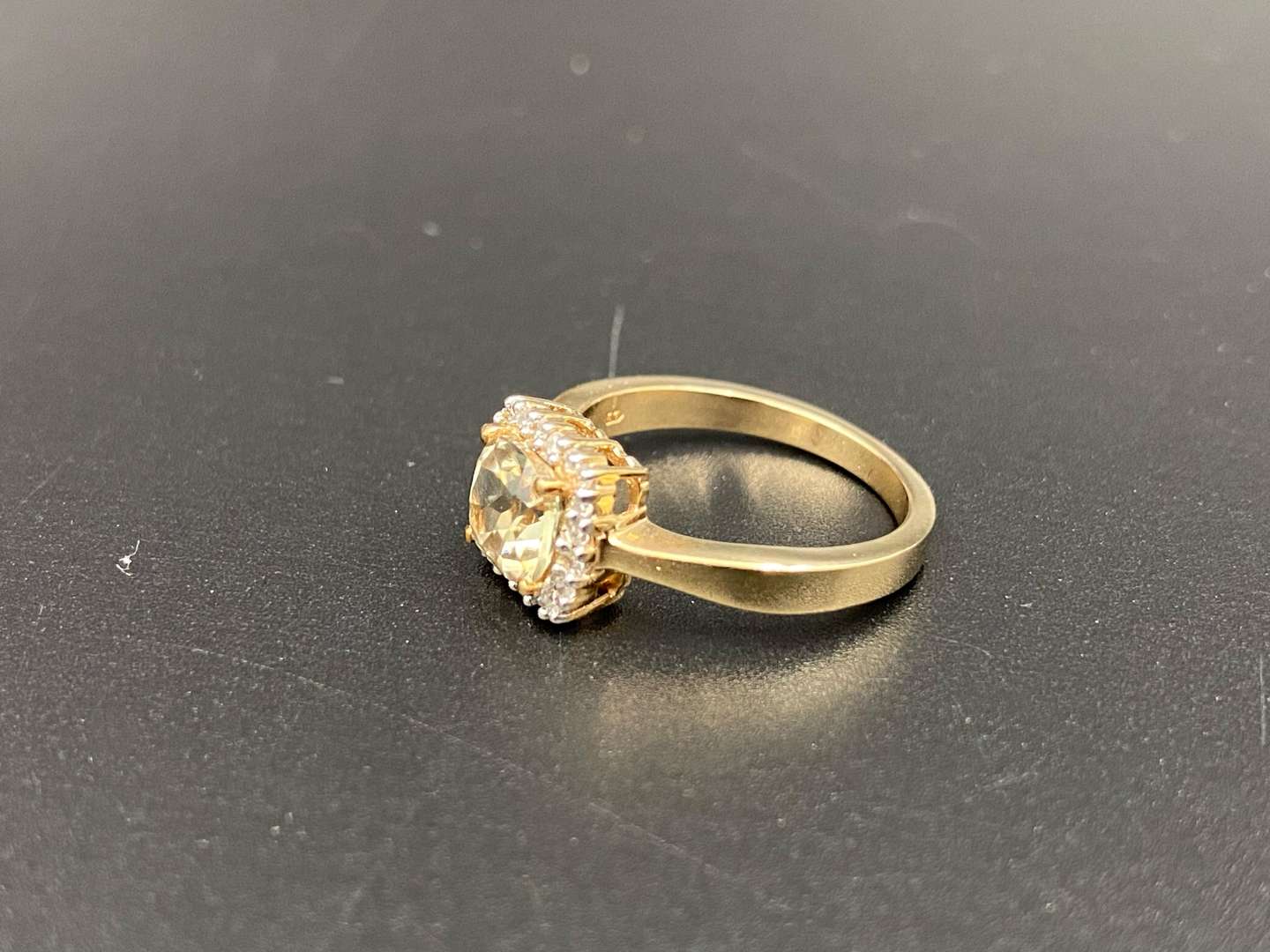 <p>A Citrine and Diamond set, 9ct gold ring.</p>