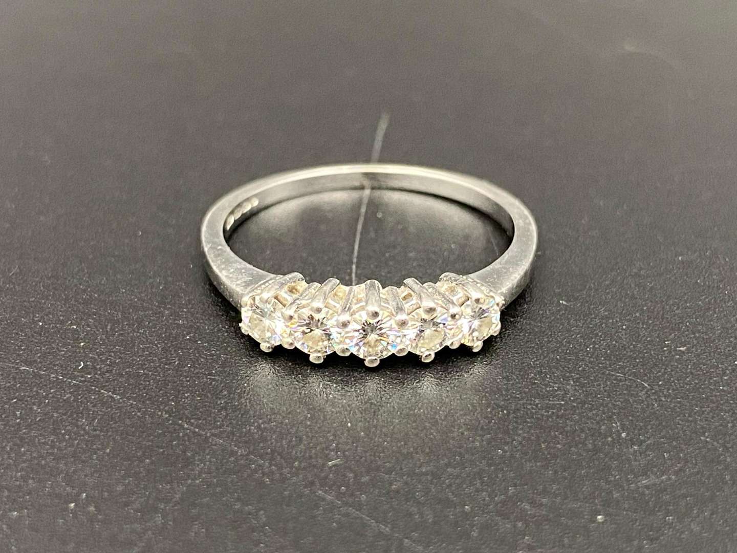 <p>A Diamond set, 9ct white gold ring,</p>