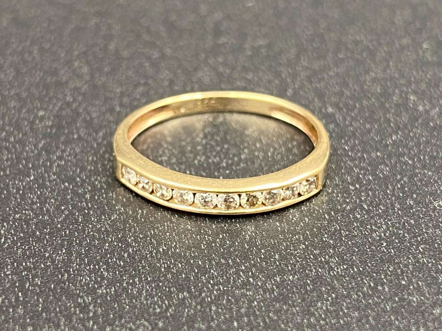 <p>A Diamond set, ½ Eternity ring,</p>