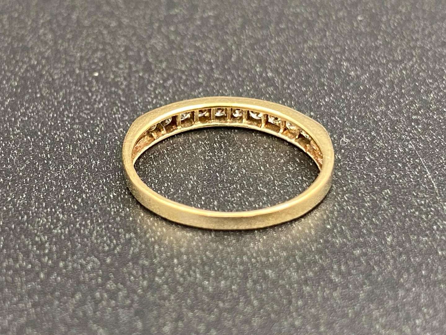 <p>A Diamond set, ½ Eternity ring,</p>