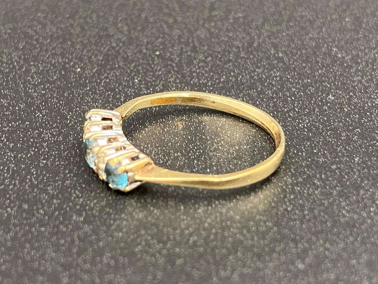 <p>A Topaz and Diamond set, three stone, 9ct gold ring</p>