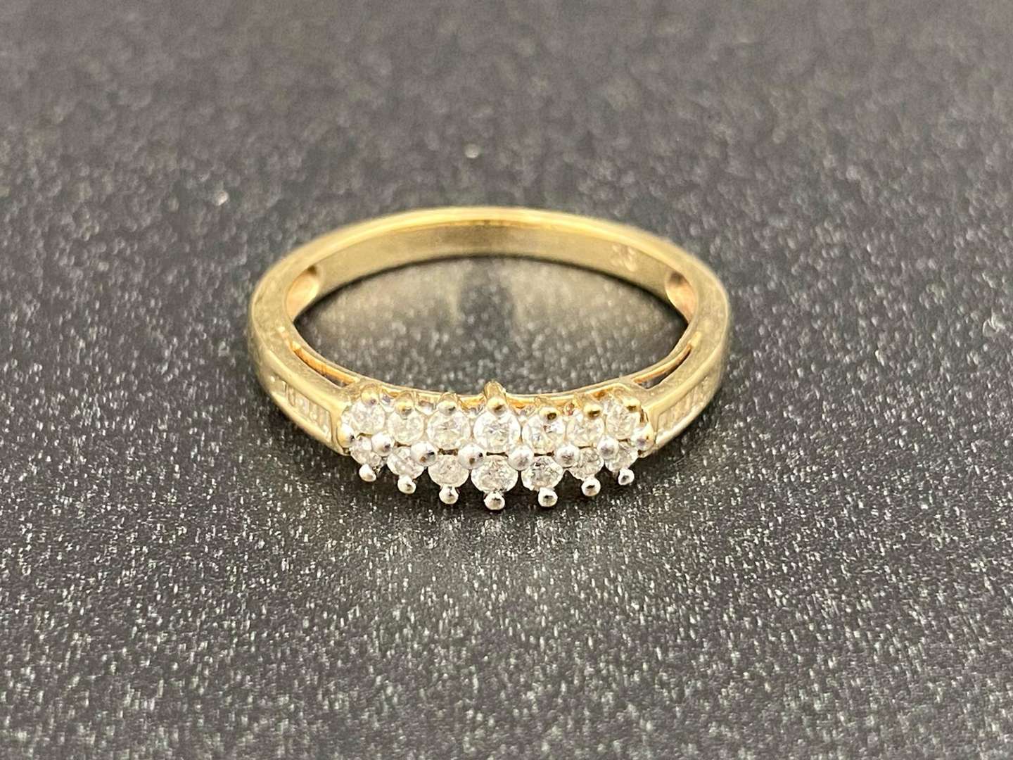 <p>A Diamond set dress ring</p>