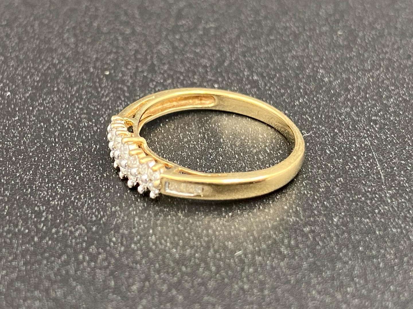 <p>A Diamond set dress ring</p>