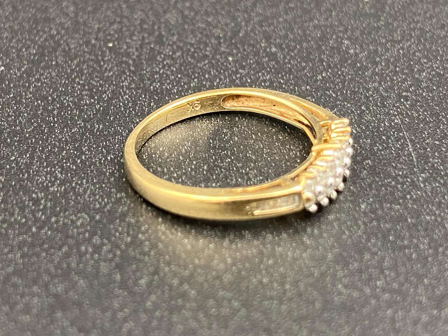 <p>A Diamond set dress ring</p>