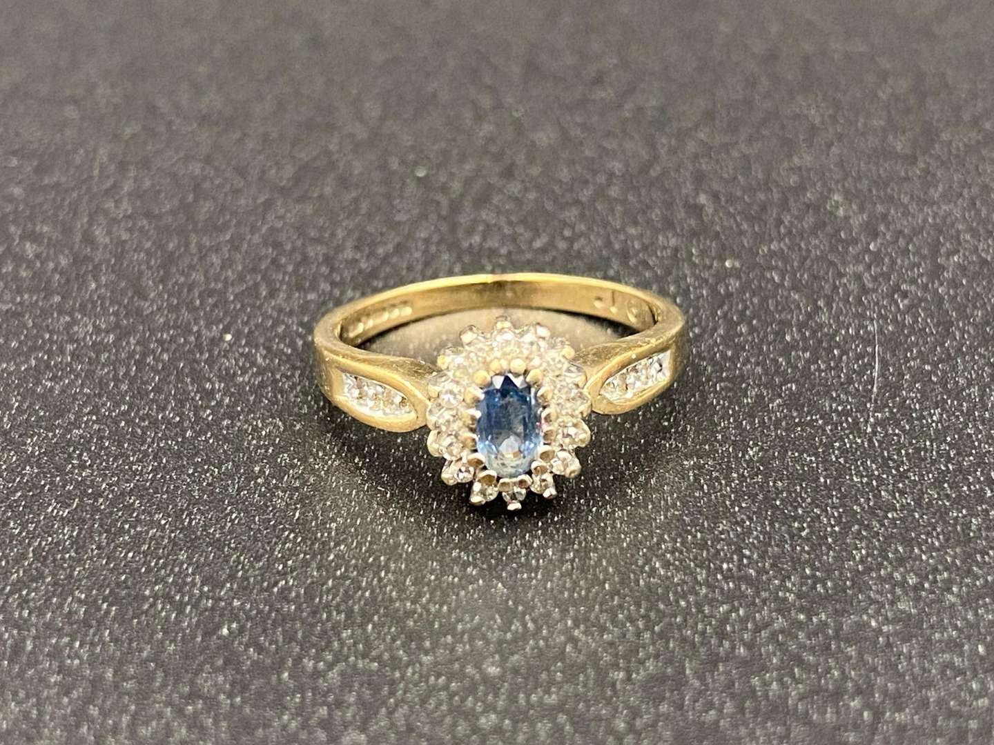 <p>A Saphire and Diamond Set, 9ct gold cluster ring,</p>