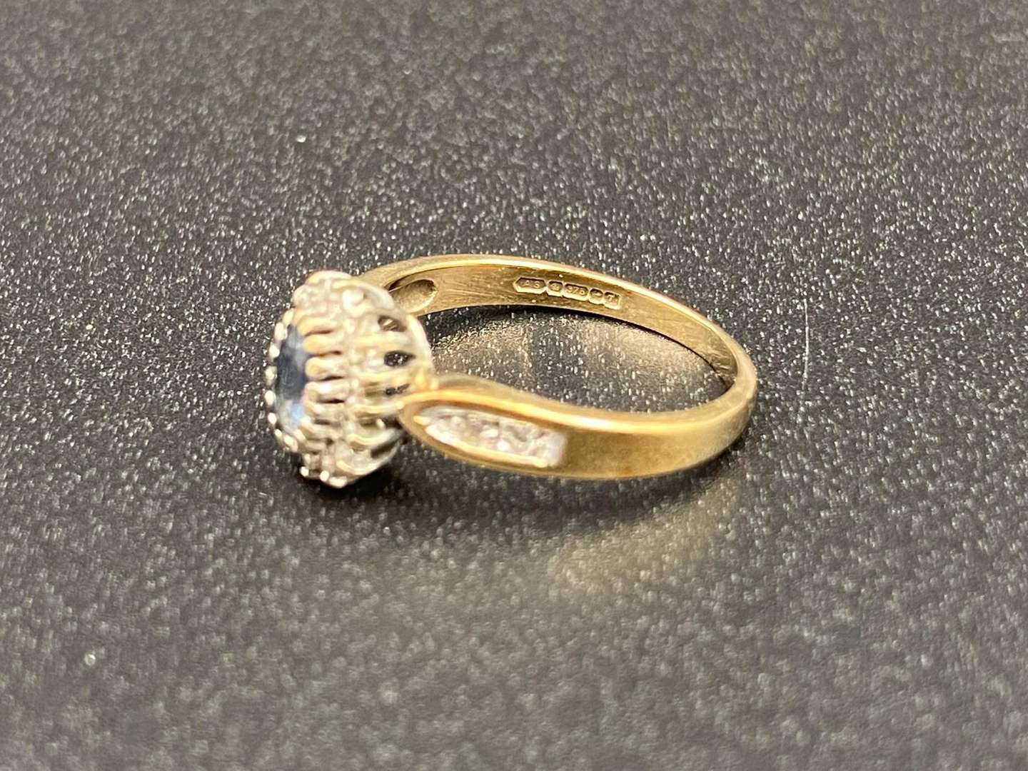 <p>A Saphire and Diamond Set, 9ct gold cluster ring,</p>