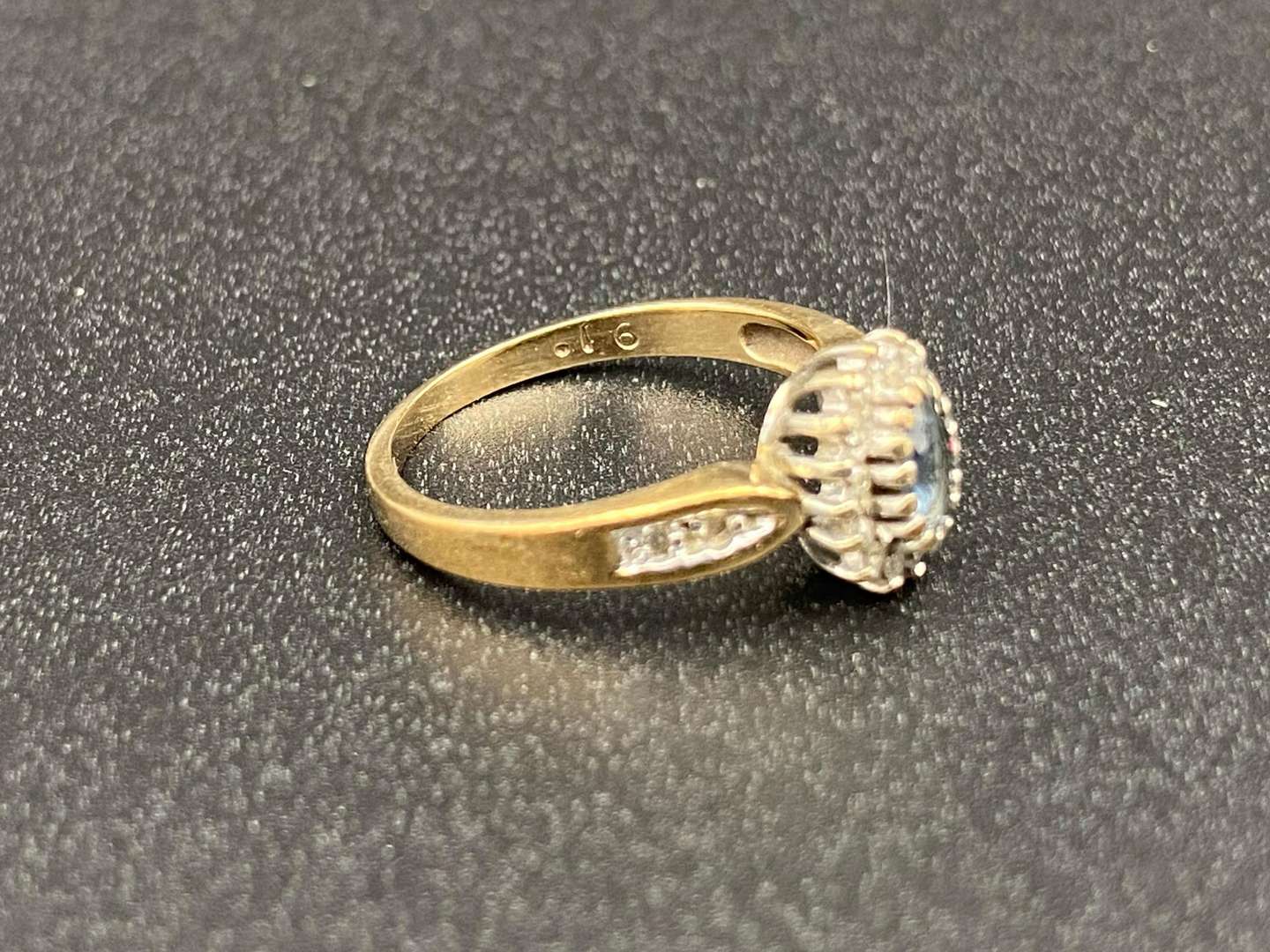 <p>A Saphire and Diamond Set, 9ct gold cluster ring,</p>