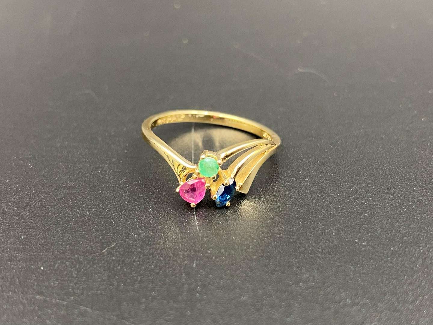 <p>An Emerald Ruby & Sapphire 9ct gold ring</p>