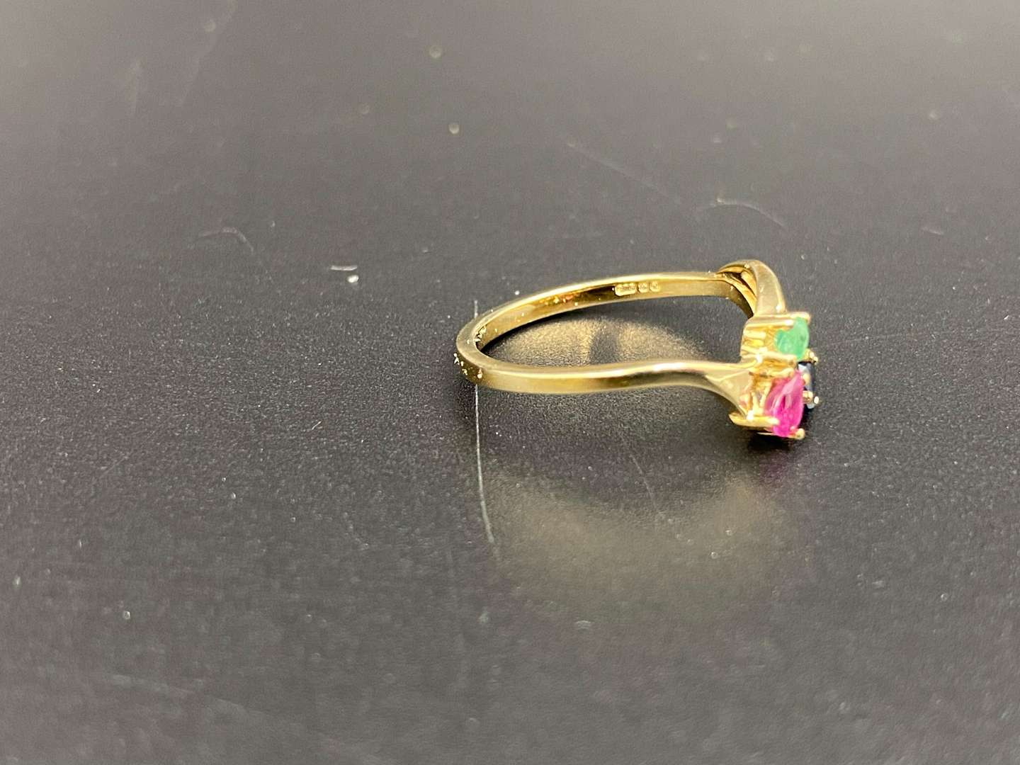 <p>An Emerald Ruby & Sapphire 9ct gold ring</p>