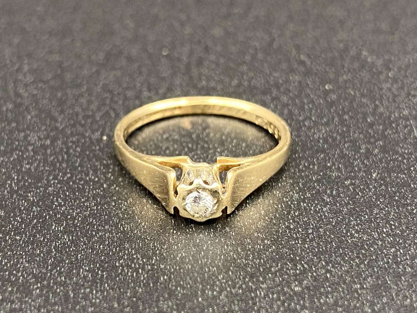 <p>A Diamond Solitaire set, 9ct gold ring,</p>