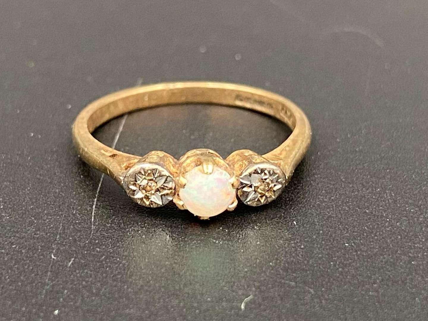 <p>An Opal and Diamond set, 9ct gold ring</p>