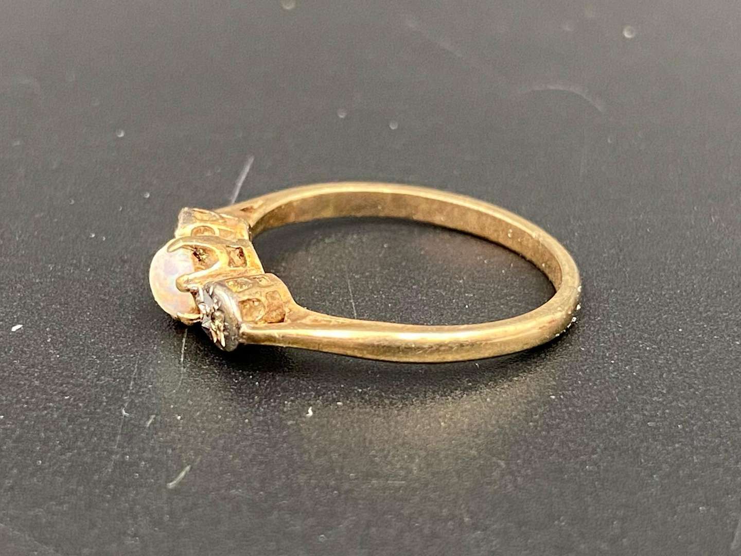 <p>An Opal and Diamond set, 9ct gold ring</p>