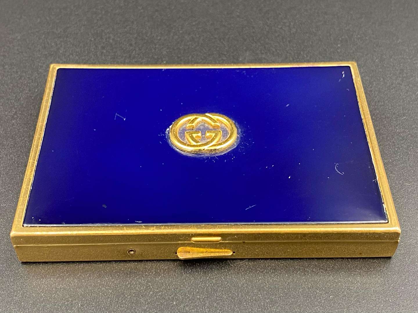 <p>GUCCI, enameled, rectangular gilt metal card/ cigarette case,</p>