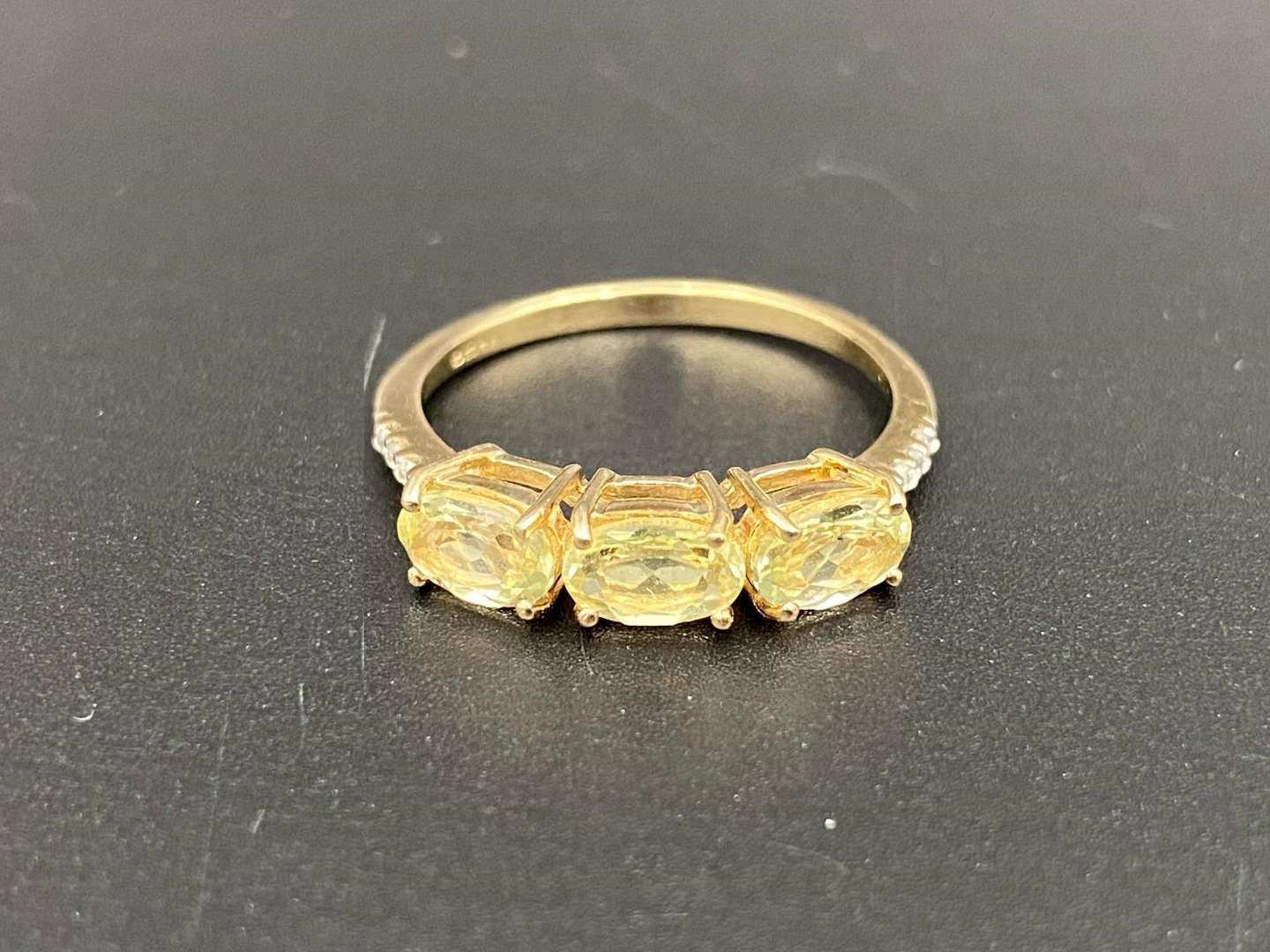 <p>A Lemon Quartz and Diamond set, 9ct gold ring,</p>